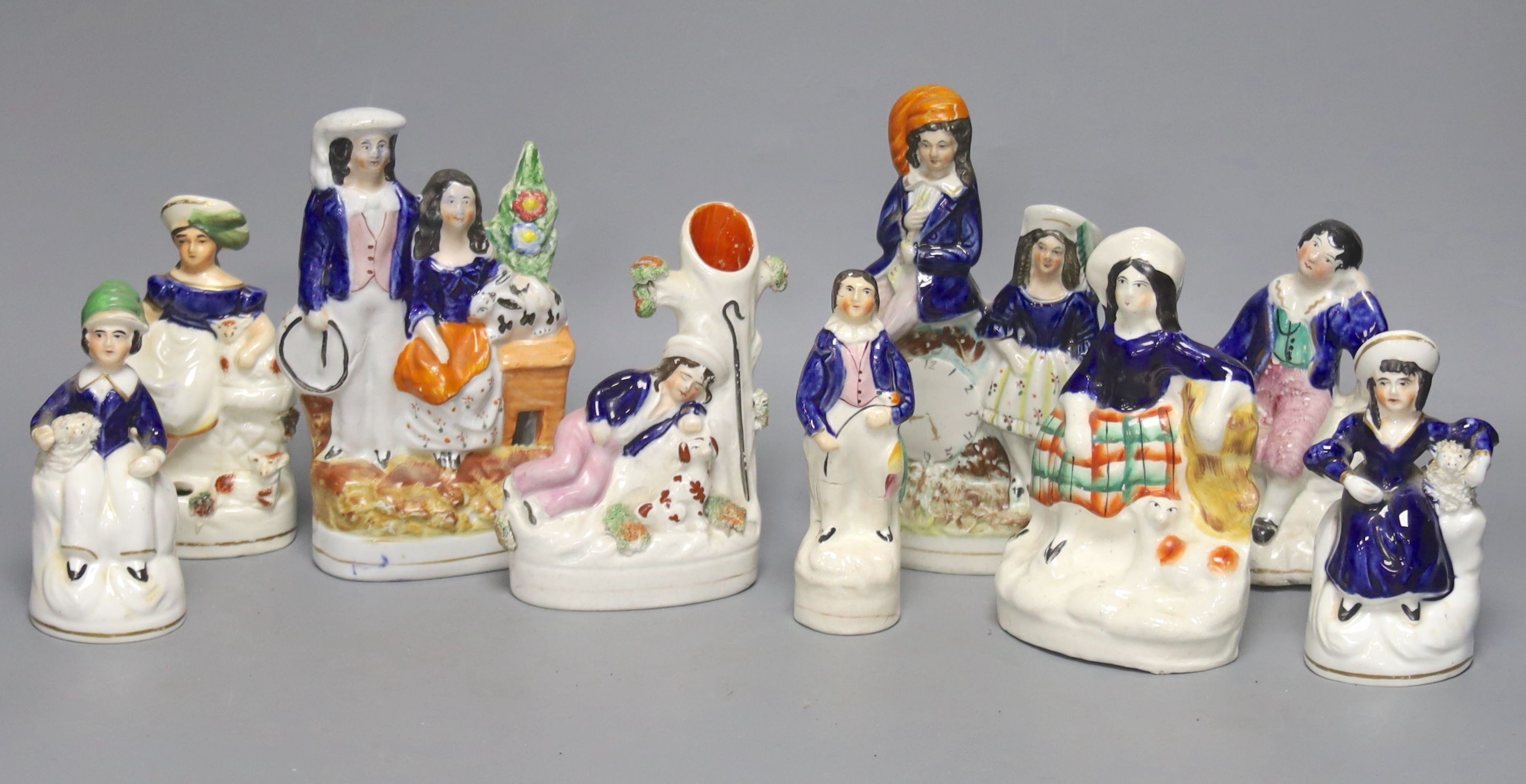 A group of nine various 19th century Staffordshire flatbacks, tallest 17cm